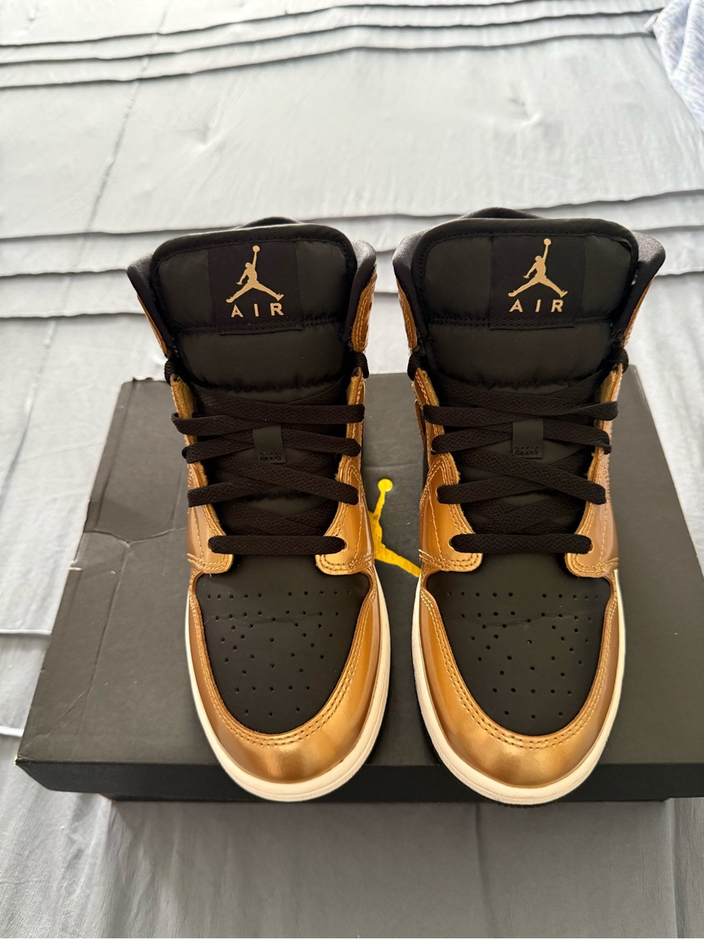 Air Jordan OG High Top Sneakers in Black and Metallic Gold